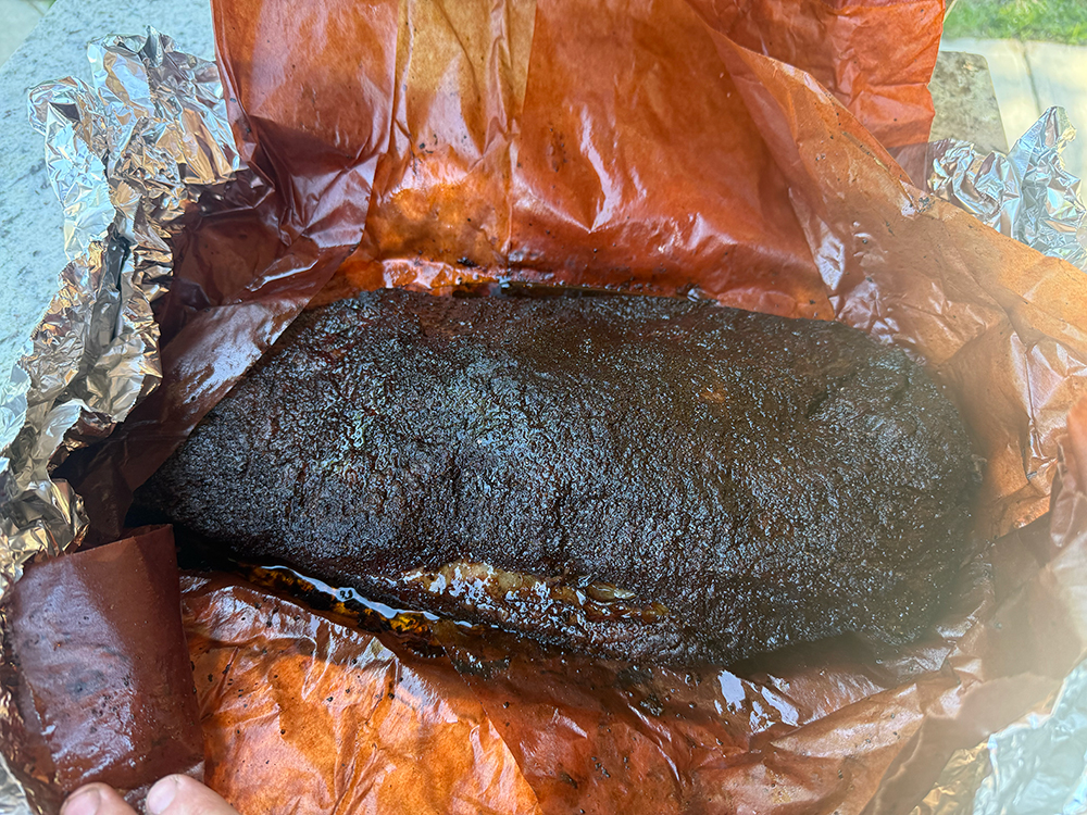 Smoked brisket fresh from the wrap