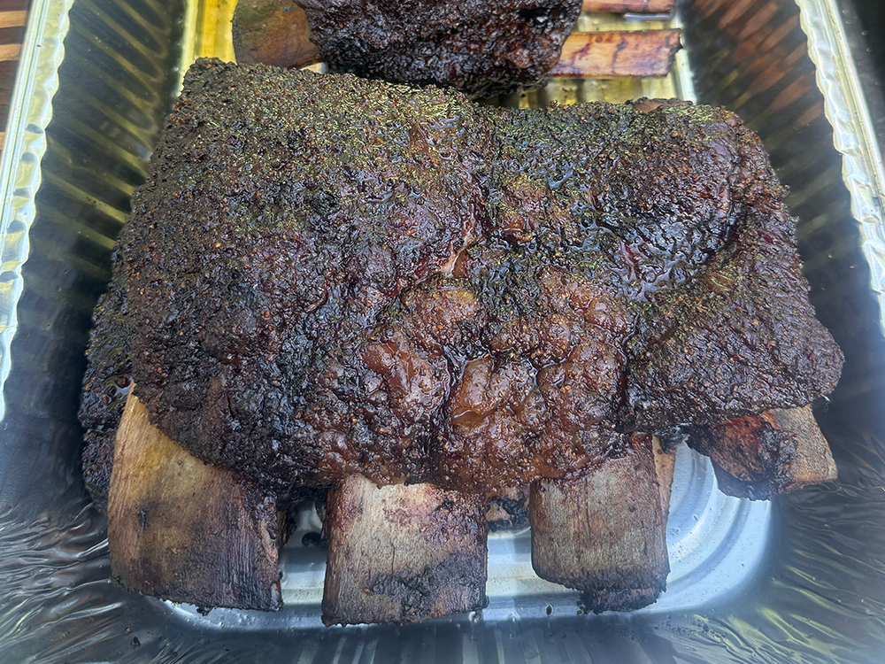 Smoked ribs in a catering tray